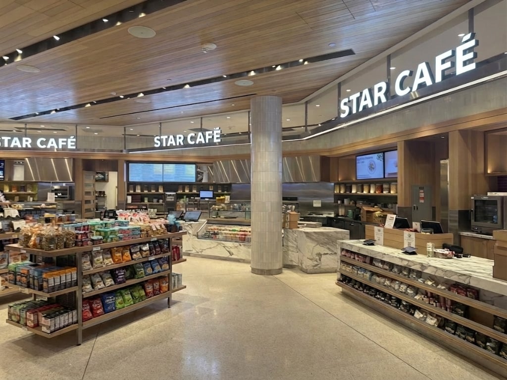 A welcoming Star café space with warm wood and an open counter